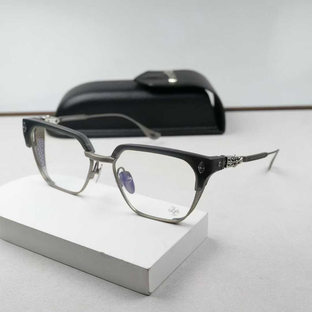 Chrome Hearts thick rimmed hollow out glasses with gold colored legs