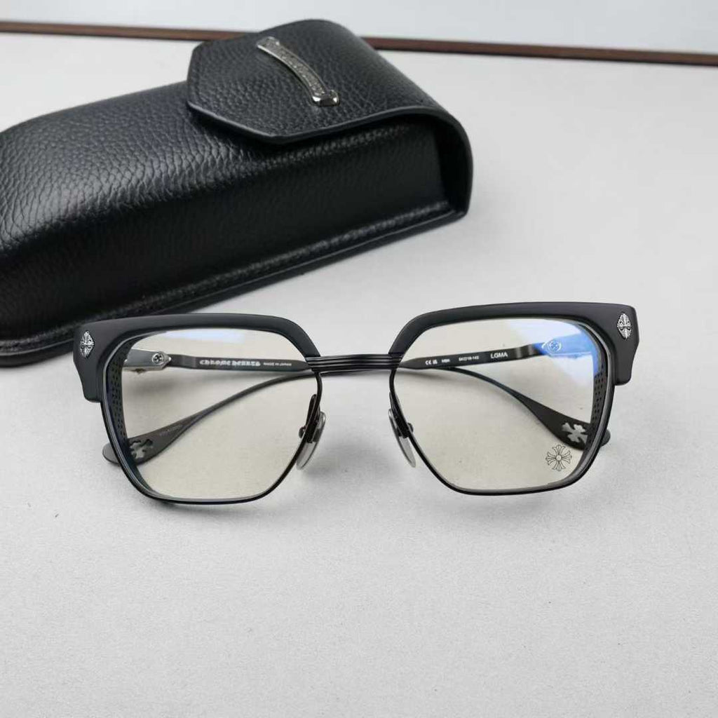 Chrome Hearts thick rimmed hollow out glasses with gold colored legs